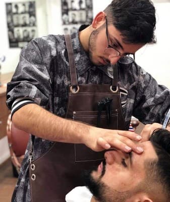 barber using razor